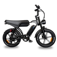 Фэтбайк QMWheel V29 Pro с двумя аккумуляторами, чёрный, вид сбоку целиком с длинным седлом, аккумулятором в раме и шинами Kenda